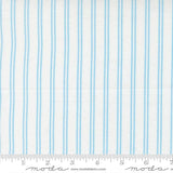 The image is a fabric with blue vertical stripes.