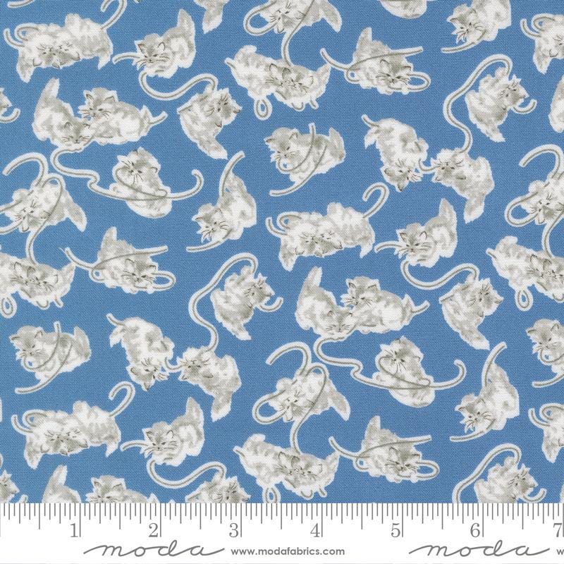 a repeating pattern of gray cats on a blue background.