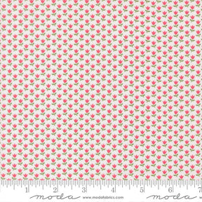 a repeating pattern of pink flowers on a white background.