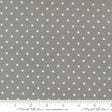 a grey fabric with white polka dots, and there is a ruler at the bottom of the image indicating the fabric's size.