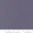 a repeating pattern of red flowers on a dark blue background.