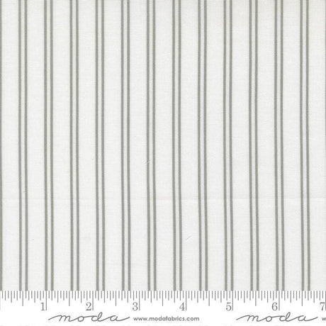 The image is a close-up of a fabric with vertical gray stripes.