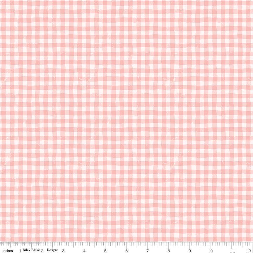 a pink and white checkered pattern, which appears to be a fabric or textile design.