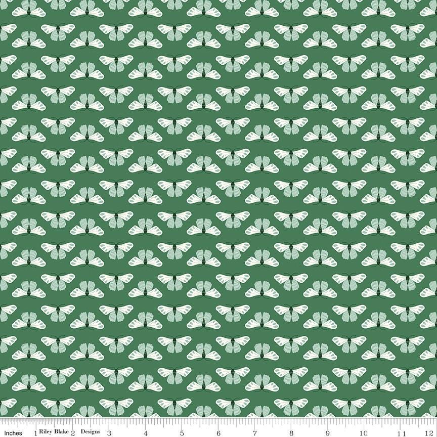 a repeating pattern of white butterflies against a green background.