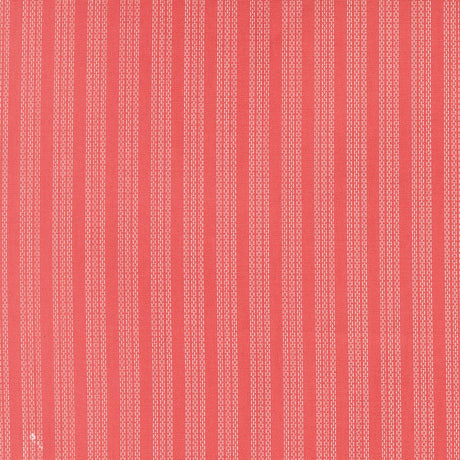 The image is a close-up of a red fabric with white vertical stripes.