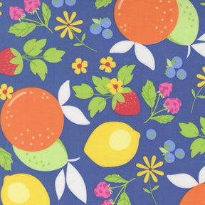 The image is a vibrant and colorful pattern featuring various fruits and flowers, including oranges, lemons, strawberries, blueberries, and daisies, all set against a blue background.