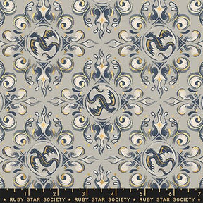 a repeating pattern of stylized dragon designs in shades of blue and gold against a light gray background.