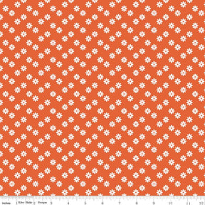 a repeating pattern of small white flowers against a bright orange background.