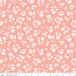 a repeating pattern of white flowers and leaves on a pink background.
