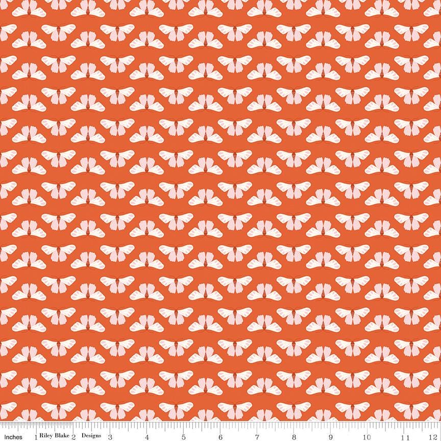 a repeating pattern of white butterflies against an orange background.