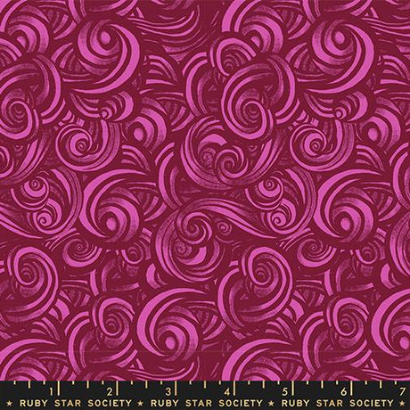 The image is a vibrant, abstract pattern with swirling shapes and lines in shades of pink and red. The pattern appears to be a repeating design, creating a sense of movement and dynamism.