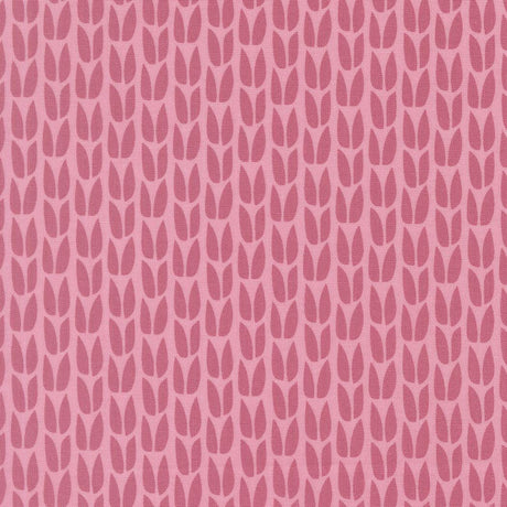 a repeating pattern of pink leaves on a pink background.