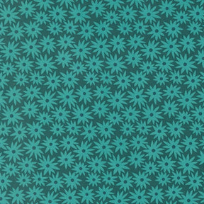 a repeating pattern of green flowers on a dark background.