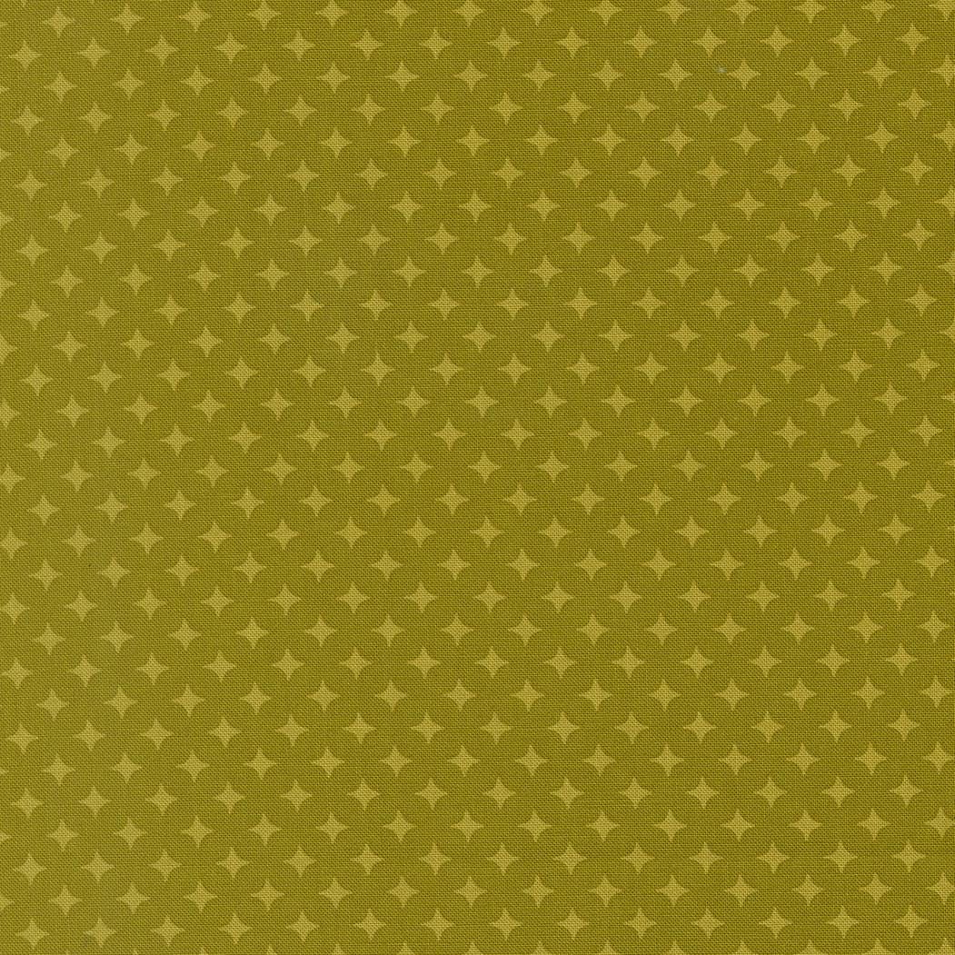 a repeating pattern of small white stars on a green background.