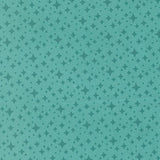 a repeating pattern of small green dots and lines on a light blue background.