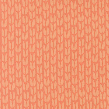 a repeating pattern of orange and white leaf-like shapes arranged in a grid-like fashion.