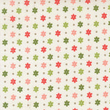 a repeating pattern of small pink, green, and red flowers with small white dots arranged in a grid-like pattern on a white background.
