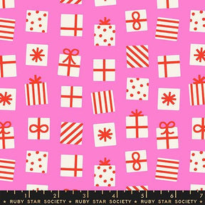 a pattern of red and white gift boxes with polka dots on a pink background.