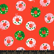 a repeating pattern of Christmas wreaths in various colors, including green, pink, and white, against a red background.