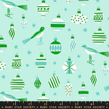 a pattern of various Christmas ornaments and birds against a light blue background.