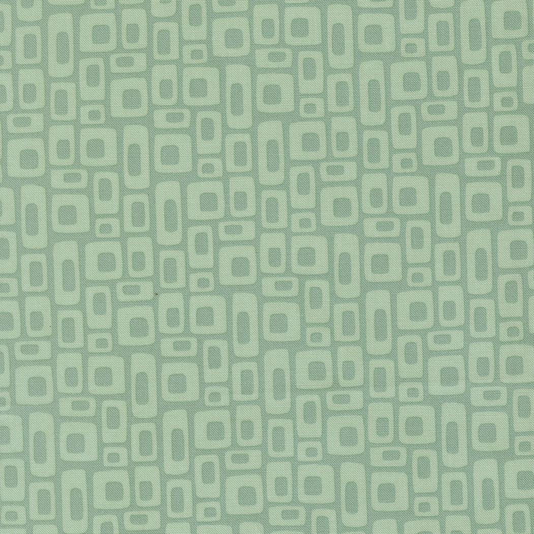a repeating pattern of small square shapes in various shades of green and gray.