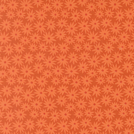 a repeating pattern of orange flowers on a dark background.