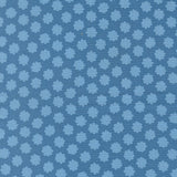 a repeating pattern of blue flowers on a blue background.