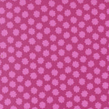 a repeating pattern of pink flowers on a purple background.