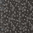 a repeating pattern of white snowflakes against a dark background.