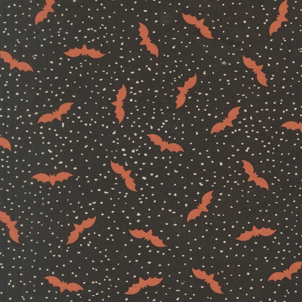 a pattern of orange bats against a dark background with white dots, creating a spooky and festive Halloween-like appearance.