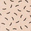 a repeating pattern of black bats against a light beige background with small orange dots scattered throughout.