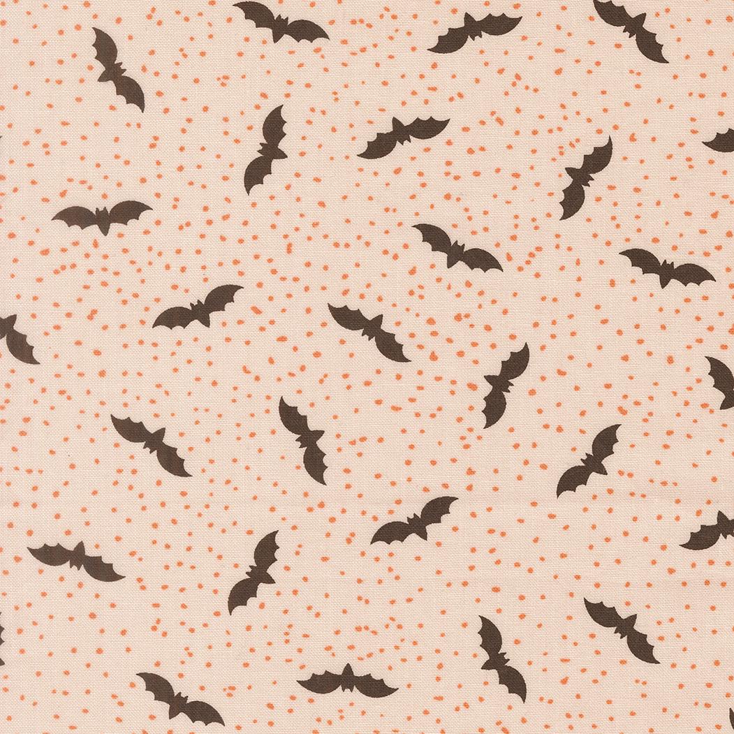 a repeating pattern of black bats against a light beige background with small orange dots scattered throughout.