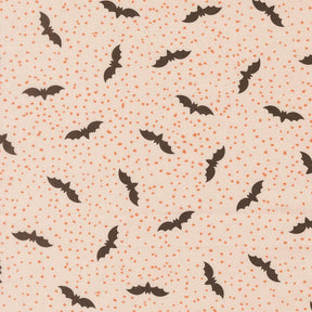 a repeating pattern of black bats against a light beige background with small orange dots scattered throughout.