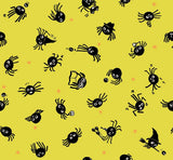 a repeating pattern of black and white cartoon-like spiders on a yellow background.