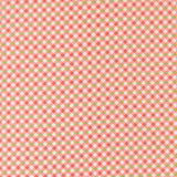 a repeating pattern of red and green checkered squares, creating a visually appealing and textured design.
