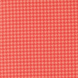 a repeating pattern of red and pink hues, creating a visually striking and symmetrical design.