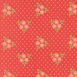 a repeating pattern of pink flowers with green leaves against a red background with white polka dots.
