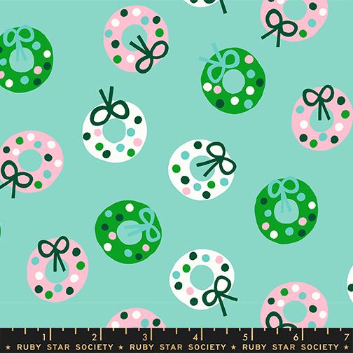 a pattern of Christmas wreaths with green bows and pink and white polka dots on a light blue background.