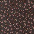 numerous red and white striped candy canes scattered across a dark background.