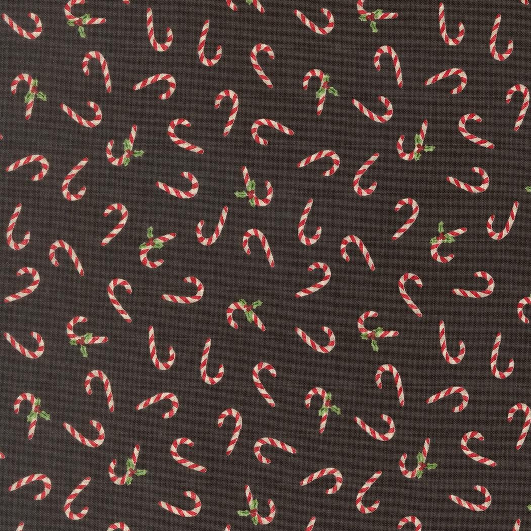 numerous red and white striped candy canes scattered across a dark background.