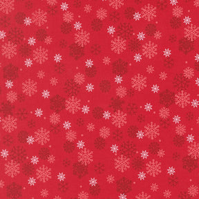 a repeating pattern of red snowflakes on a red background.