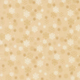 a repeating pattern of white and gold snowflakes on a beige background.