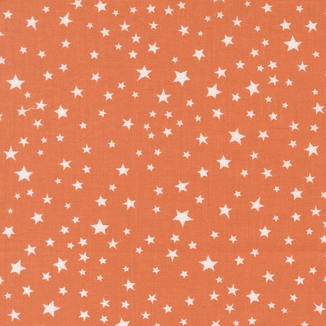 a repeating pattern of white stars against an orange background.