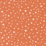 a repeating pattern of white stars against an orange background.