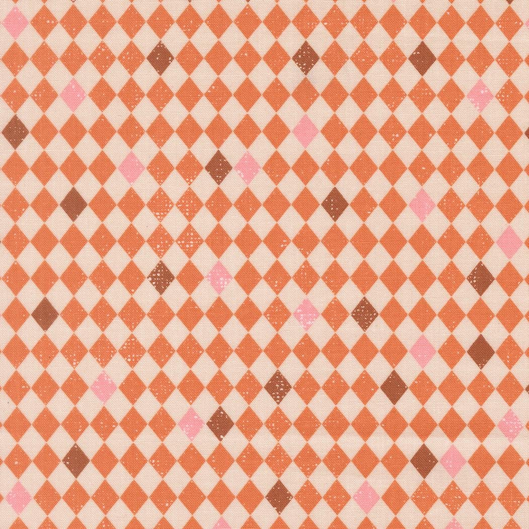 a repeating pattern of orange and pink squares arranged in a checkered or diamond-like design.