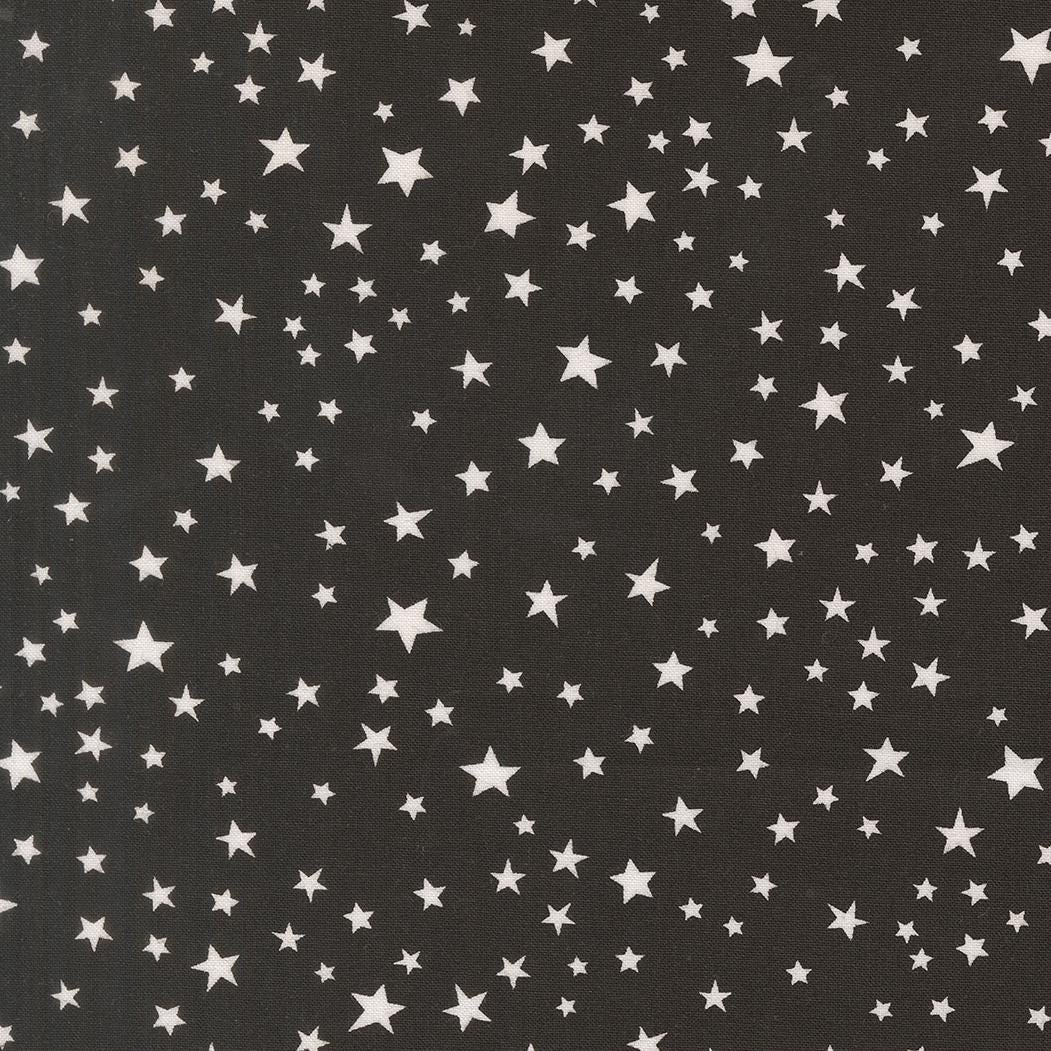 a black background with numerous white stars scattered across it, creating a starry night sky effect.