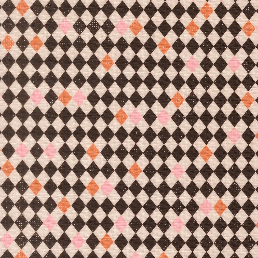 a repeating pattern of black and white diamonds with small pink and orange accents, creating a visually striking and geometric design.