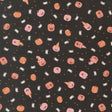 a repeating pattern of Halloween-themed pumpkins and bats against a black background.