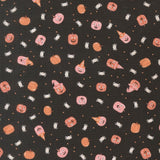 a repeating pattern of Halloween-themed pumpkins and bats against a black background.