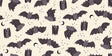 a repeating pattern of bats and crescent moons against a light background.